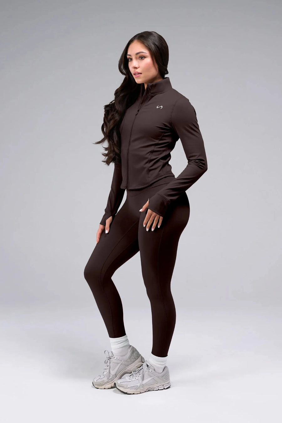 Side View Of Tempo High Waisted Workout Leggings in Dark Oak