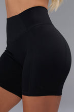 Side View of Black TLF Tempo Scrunch Butt Shorts, featuring a butt scrunch that shapes your glutes with a snatched waist seam design 