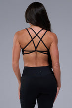 Back View of Black TLF Tempo Strappy Back Sports Bra, featuring a minimal design for the gym and lifestyle wear 
