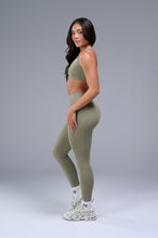Vetiver TLF Tempo Strappy Back Sports Bra — product video showing the strappy back design and minimal silhouette