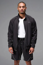 Front View of Black TLF Track Jacket (Men’s GTS Gym-To-Street Edition) with mesh lining, reflective piping, and premium trims for all-day Gym-To-Street wear. 