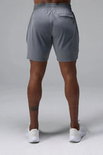 Back View of Gray TLF Train Element 7 Inch Shorts featuring a 7 inch in seam and side zipper pockets designed for optimal performance