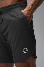 Detail Front View of Black TLF Train Element 7 Inch Shorts featuring a 7 inch in seam and side zipper pockets designed for optimal performance