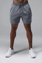 Front View of Gray TLF Train Element 7 Inch Shorts featuring a 7 inch in seam and side zipper pockets designed for optimal performance