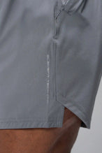 Detail Front View of Gray TLF Train Element 7 Inch Shorts featuring a 7 inch in seam and side zipper pockets designed for optimal performance