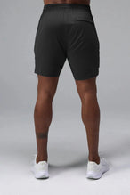 Back View of Black TLF Train Element 7 Inch Shorts featuring a 7 inch in seam and side zipper pockets designed for optimal performance
