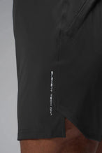 Front View of Black TLF Train Element 7 Inch Shorts featuring a 7 inch in seam and side zipper pockets designed for optimal performance