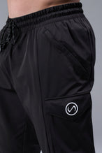 Detail Front View of Black TLF Train Element 7/8 Joggers 2.0, featuring side cargo pockets in an athletic 7/8 length and side zipper pockets 