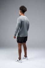 Back View of Gray TLF Train Infi-Dry Long Sleeve, featuring our Infi-Dry fabric technology and reflective sleeve design for night running 