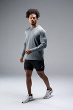 Front View of Gray TLF Train Infi-Dry Long Sleeve, featuring our Infi-Dry fabric technology and reflective sleeve design for night running 