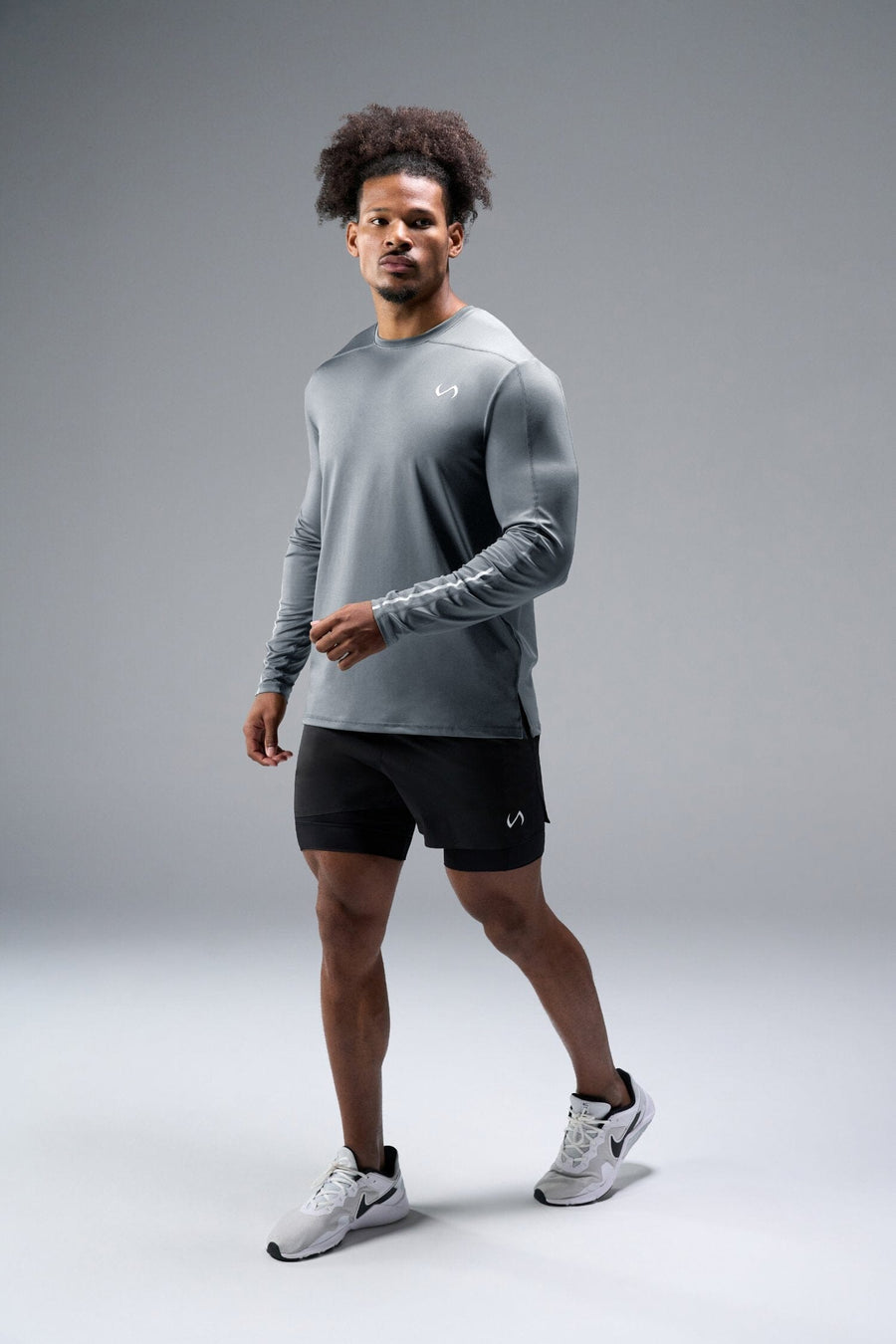 Front View of Gray TLF Train Infi-Dry Long Sleeve, featuring our Infi-Dry fabric technology and reflective sleeve design for night running 